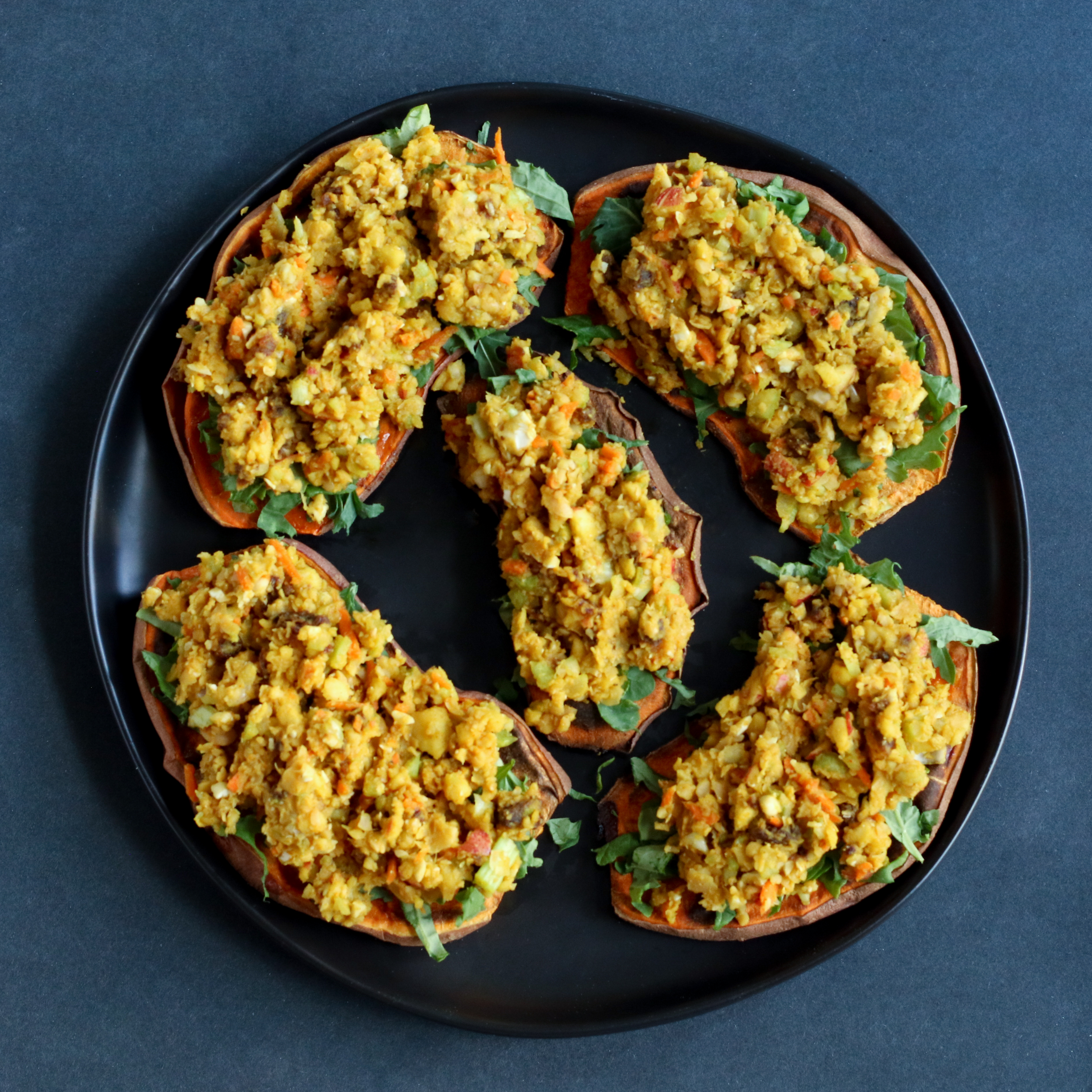 sweet potatoes topped with curried chickpeas